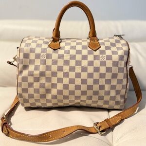 Stylish Checkered Satchel with Tan Leather Accents